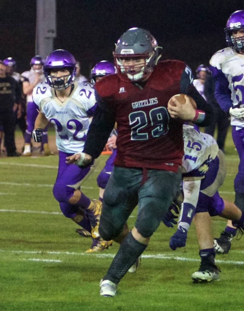 Hoquiam running back Matt Brown carries the football during Fridays win over Sequim. (Photo by Patti Reynvaan)