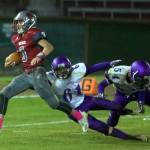 Hoquiam running back Antonio Garcia breaks free for a long run while Sequims Isaiah Cowan during the Grizzlies 42-35 victory on Friday. The Grizzlies remain undefeated on the season at 8-0 with the victory. (Photo by Patti Reynvaan)