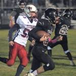 Ocostas Kobe Beck runs down the sidelines in the second quarter of a game against Pe Ell-Willapa Valley. (Hasani Grayson | Grays Harbor News Group)
