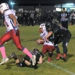 Ocostas Tucker Deranleau brings down Pe Ell-Willapa Valleys Landin Isaken after a gain in the third quarter. Isaken ran for 86 yards on 10 carries with a touchdown. (Hasani Grayson | Grays Harbor News Group)