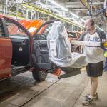 A Ford employee installs a seat on a 2019 Ford Ranger at the Michigan Assembly Plant. (Ford Motor Co.)