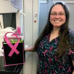 photos by Kat Bryant | Grays Harbor News Group                                Dawn Heckathorns mission is to spread information to every woman (and man) in the area about breast cancer, from early detection to treatment. For patients whove been diagnosed with breast cancer, she prepares a bundle of information, including this Ready for Recovery journal and treatment planner, funded by a grant from the Komen Foundation.