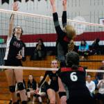 Ocostas Kylee Poirier gets a shot over the net in the fourth set against Wahkiakum. (Hasani Grayson | Grays Harbor News Group)