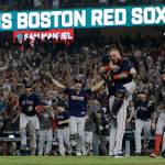 Boston Red Sox Christian Vazquez and Chris Sale celebrate winning the World Series against the Los Angeles Dodgers in Game 5 of the World Series on Sunday, Oct. 28, 2018 at Dodger Stadium in Los Angeles, Calif. (Robert Gauthier/Los Angeles Times/TNS)