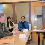 DAN HAMMOCK | GRAYS HARBOR NEWS GROUP                                Sen. Maria Cantwell, at right, talks to Grays Harbor County Sheriff Rick Scott at a panel discussion about opioid addiction in Aberdeen Monday morning. Scott explained his jail is filled to capacity and 90 percent of the inmates suffer from some kind of addiction.