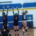 Ocostas Layne Martin picks up a kill in the first set against Kalama. Martin led the team in kills with four. (Hasani Grayson | Grays Harbor News Group)