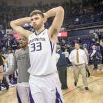 Washingtons Sam Timmins (33) and the Huskies leave the floor having failed to improve their tournament hopes, losing the regular season finale to Oregon, 72-64, on Saturday, March 3, 2018, at Alaska Airlines Arena in Seattle. (Dean Rutz/Seattle Times/TNS)