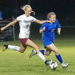 Montesanos Anna Ayers, left, battles for possession with Elmas Rebeka Lensegrav on Oct. 18. Ayres was named co-offensive MVP for the 1A Evergreen league. (Photo by Shawn Donnelly)