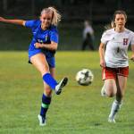 Elmas Brooke Sutherby, left, takes a shot on goal during a home game against Hoquiam on Sept. 27. Sutherby was named the 1A Evergreen leagues co-MVP for offense earlier this week. (Hasani Grayson | Grays Harbor News Group)