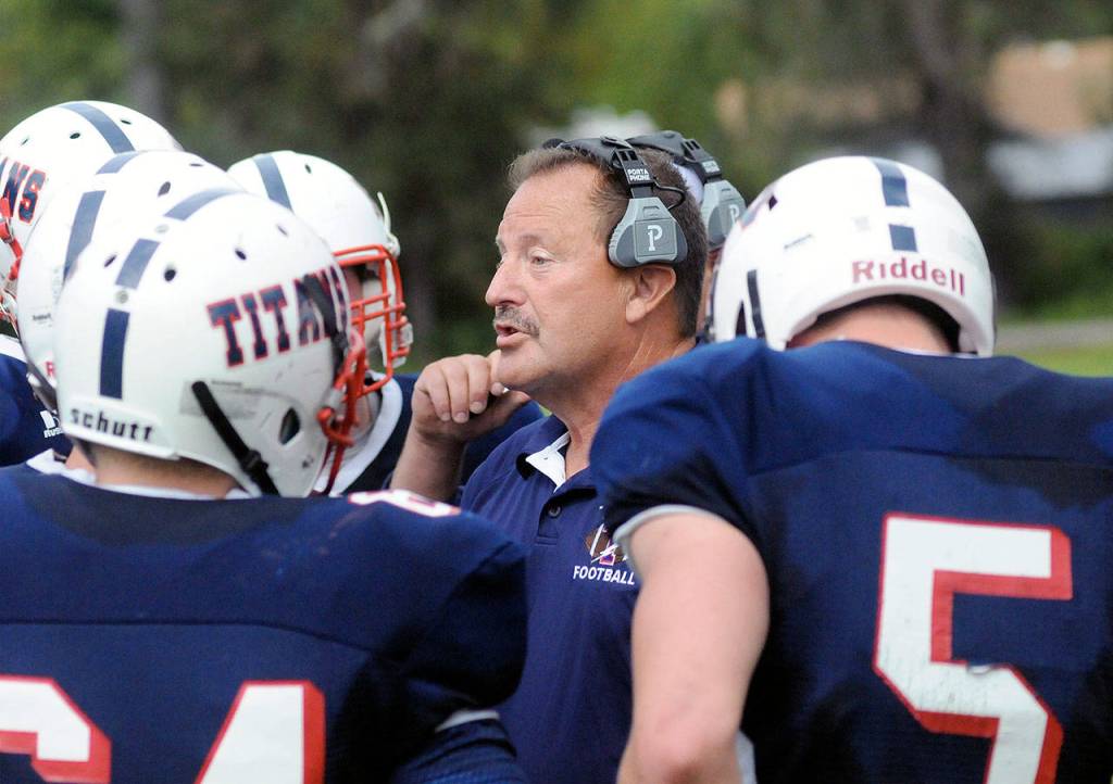 PWV head coach Josh Fluke, middle, was named the 2B Costal leagues Coach of the Year after leading the Titans to a league title and state playoff berth. (Ryan Sparks | Grays Harbor News Group)