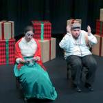 (Keith Krueger) In another window display, Johnny Pat (Matthew Kline) pleads with Cathleen (Carli Bains) against the Irish tradition of leaving the front door open for Mary and Joseph on Christmas Eve.