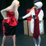 (Keith Krueger) A display model (Sadie Karl) is hesitant to hold hands with an overly enthusiastic snowman (Susanna Watkins).