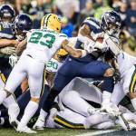 Seattle Seahawks running back Chris Carson takes the ball across the line for a 1-yard touchdown in the second quarter against the Green Bay Packers at CenturyLink Field in Seattle on Thursday, Nov. 15, 2018. (Bettina Hansen/Seattle Times/TNS)