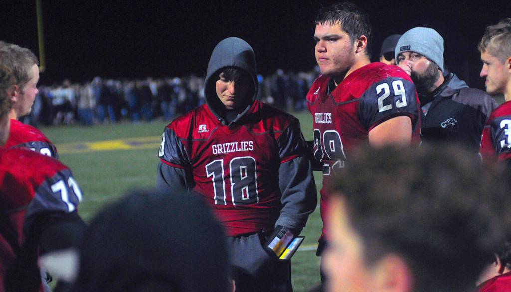 Payton Quintanilla, left, tearfully addresses his team with Matt Brown at his side following Hoquiams loss Lynden Christian in the 1A State Quarterfinal game on Saturday. Quintanilla aggravated an ankle injury in the second quarter and didnt play the remainder of the game. (Hasani Grayson | Grays Harbor News Group)