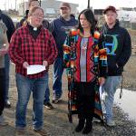(Louis Krauss | Grays Harbor News Group)                                From left: Leah Briley, a formerly homeless woman, the Rev. Sarah Monroe, Revival of Grays Harbor President Phil Calloway, Apryl Boling and Levi Hunt, another formerly homeless person, stand next to the gate to the Chehalis riverfront camps.