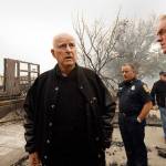California Gov. Jerry Brown, left, tours downtown Paradise, Calif., on Nov. 14 with Secretary of the Interior Ryan Zinke, right, as they view the damage done to Paradise Elementary School. (Carolyn Cole/Los Angeles Times)