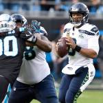 Seattle Seahawks quarterback Russell Wilson (3) looks to throw downfield against the Carolina Panthers in the second half on Sunday, Nov. 25, 2018 at Bank of America Stadium in Charlotte, N.C. (David T. Foster III/Charlotte Observer/TNS)