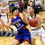 Willapa Valleys Brooke Friese, left, pressures Raymonds Ana Silva during a game on Thursday at Raymond High School. (Photo by Larry Bale)