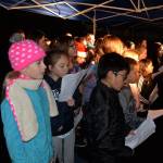 (Louis Krauss | Grays Harbor News Group)                                Robert Gray Elementary students sing Christmas tunes at Fridays Winterfest event in Aberdeen.