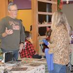 DAN HAMMOCK | GRAYS HARBOR NEWS GROUP                                Aberdeen Main Street director Wil Russoul explains the program to a shopper at the Aberdeen Winterfest holiday market Saturday morning. The market featured about 30 vendors selling a variety of handcrafted and locally-produced items.                                DAN HAMMOCK | GRAYS HARBOR NEWS GROUP                                The free trolley shuttled shoppers through downtown Aberdeen during the 2018 Winterfest celebration Saturday afternoon. The celebration shifted south of the river to the Grays Harbor Historical Seaport at 1 p.m., where there were activities for the kids, pictures with Santa, a tribal art display and a Christmas tree lighting on the dock at 6 p.m.