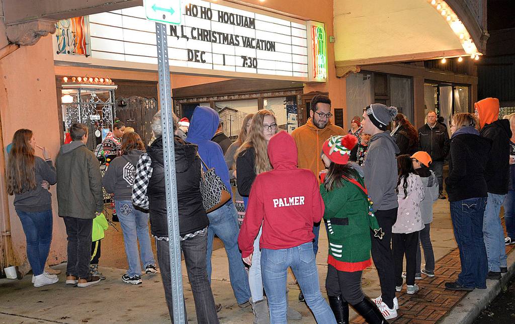 DAN HAMMOCK | GRAYS HARBOR NEWS GROUP                                Crowds were forming early outside the 7th Street Theatre Saturday for the annual Ho Ho Hoquiam celebration, sponsored by the Hoquiam Business Association.