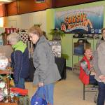 DAN HAMMOCK | GRAYS HARBOR NEWS GROUP                                Dozens of vendors offered a variety of handcrafted and holiday-themed items at the Aberdeen Winterfest 2018 holiday market at the old Goldbergs Furniture location on West Wishkah Saturday. Many local businesses also participated in free drawings, the winners of which will be chosen Tuesday.