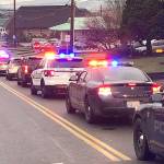 Law enforcement vehicles from across Grays Harbor County filled with kids head to Walmart from breakfast at Aberdeen High School Saturday morning for the 2018 Shop with a Cop event.