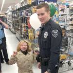 Hoquiam Police officer Christian Slater led this youngster through Walmart Saturday morning during the Grays Harbor County Shop with a Cop event. Each kid got a $100 gift certificate to spend on whatever they wanted.