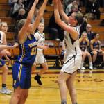 Montes Paige Lisherness, right, puts up a jump shot over Rochesters Emily Elkins in the Bulldogs overtime loss on Tuesday in Montesano. (Ryan Sparks | Grays Harbor News Group)