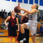 Elmas Quin Mikel hits a layup against Centralia on Wednesday. Mikel put up 12 points in Elmas 67-23 win. (Hasani Grayson | Grays Harbor News Group)