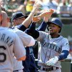 Popular Mariners outfielder Dee Gordon, seen here celebrating a two-run home run against Oakland on Sept. 14, could be traded as Mariners GM Jerry Dipoto continues to rebuild the roster. (Doug Duran/Bay Area News Group/TNS)