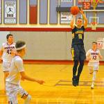 Aberdeens Ben Dublanko pulls up and hits a three in transition on Friday against Hoquiam. Dublanko scored 41 points in the Bobcats 84-47 win over the Grizzlies. (Hasani Grayson | Grays Harbor News Group)