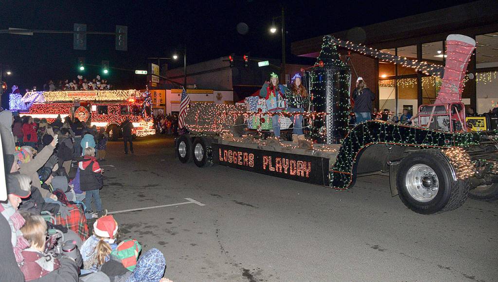 DAN HAMMOCK | GRAYS HARBOR NEWS GROUP                                The Hoquiam Loggers Playday entry took best of theme honors at the Montesano Festival of Lights parade Saturday.