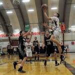 Raymonds Tre Seydel hits a layup against Pe Ell on Saturday. Seydel scored a team-leading 19 points in the contest. (Hasani Grayson | Grays Harbor News Group)