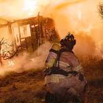 PHOTO COURTESY OF GRAYS HARBOR FIRE DISTRICT 5                                About 40 firefighters battled this blaze on Blockhouse Road North in Elma Sunday evening.