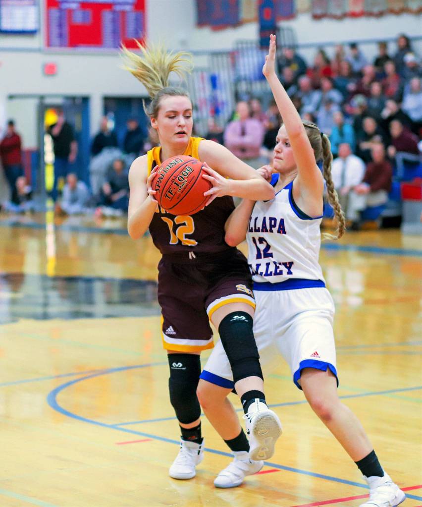 South Bends Karley Reidinger, left, is defended by Willapa Valleys Katie Adkins during the Vikings 39-27 win on Thursday in Menlo. (Photo by Larry Bale)
