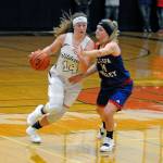 Ocostas Kaylee Barnum, left, dribbles against Willapa Valleys Katie Adkins on Saturday in Westport. (Ryan Sparks | Grays Harbor News Group)
