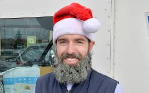 DAN HAMMOCK | GRAYS HARBOR NEWS GROUP                                Caleb Small is a young family man from Cosmopolis who wondered, how could he, as a postal carrier in Aberdeen, brighten everyones day? His solution was to grow out his beard and festoon it with twinkling lights and glitter. The father of five said he just wanted to find a way to spread joy on a daily basis.