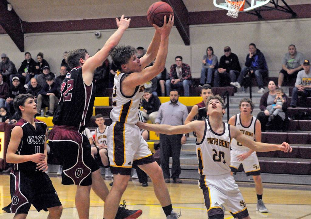 South Bends Drew Rose grabs a rebound in the second quarter of a game against Ocosta on Wednesday. Rose posted 19 points and grabbed 11 rebounds in the 54-50 loss. (Hasani Grayson | Grays Harbor News Group)