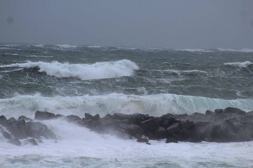 (Angelo Bruscas | Grays Harbor News Group) Large swelling waves crash against the Westport Jetty.