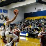 Aberdeens Wyatt Johnson, LEFT, streaks to the basket for a layup in the first quarter against Hoquiam. (Hasani Grayson | Grays Harbor News Group)