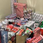 (Courtesy Kyna Wilson) Christmas gifts filled five rooms at Hands-on-Health Chiropractic in Montesano earlier this month. The business led an effort to give presents to about 30 families in Grays Harbor County.