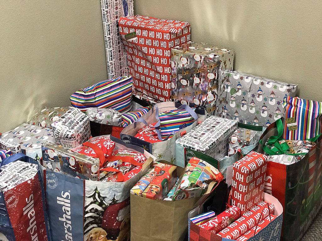 (Courtesy Kyna Wilson) Christmas gifts filled five rooms at Hands-on-Health Chiropractic in Montesano earlier this month. The business led an effort to give presents to about 30 families in Grays Harbor County.
