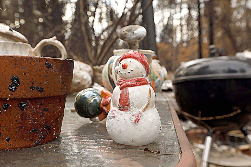 Just a few small items remain of the Christmas decorations that Anne Wycoff had in her home in Paradise, which was destroyed by the Camp fire. Wycoff and her boyfriend were renting the home and did not have renters insurance, so lost everything. (Carolyn Cole/Los Angeles Times)