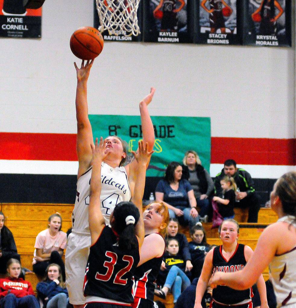 Kristi Raffelson puts up a close range shot against Raymond on Friday. Raffelson led the Wildcats in rebounds with 11. (Hasani Grayson | Grays Harbor News Group)