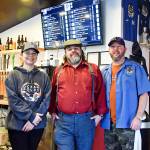 From left, bartender Beth Douglas, general manager Chris Shifman and co-owner Randy Gardner of the newly opened Ocean Pours Taproom.