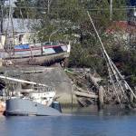 Kat Bryant | Grays Harbor News Group                                The owner of 220 Monroe St., where four boats sank in the Hoquiam River in 2018 (adding to three others since July 2017), has been cited numerous times for city code violations, including the presence of junk boats and cars and operating a business without a license. Salvage and cleanup of the sunken vessels remain up in the air as the owner and various government agencies squabble over responsibility.