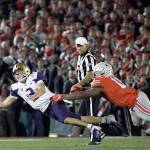 Washington Huskies quarterback Jake Browning (3) is tackled by Ohio State defensive end Tyreke Smith (11) during the second half of the Rose Bowl Game presented by Northwestern Mutual at the Rose Bowl on Tuesday, Jan. 1, 2019 in Pasadena, Calif. (Harry How/Getty Images/TNS)
