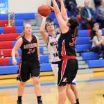 Willapa Valleys Britney Patrick puts up a shot against Raymonds Hannah Miller (34) during the Vikings 49-37 victory on Saturday in Raymond. (Photo by Larry Bale)