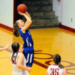 Elams Jillian Bieker hits a layup in the third quarter of a game against Hoquiam on Saturday night. (Hasani Grayson | Grays Harbor News Group)